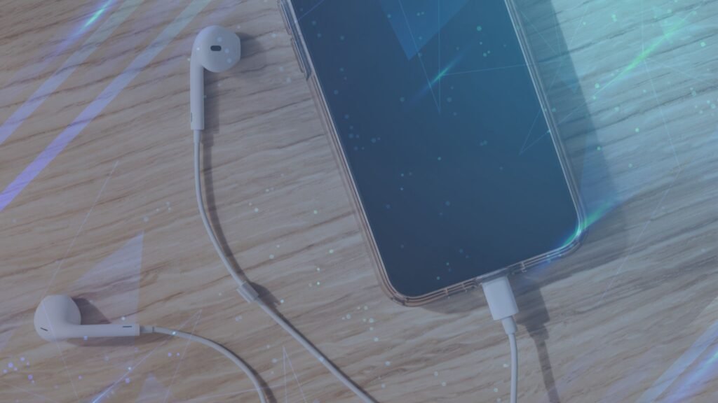 Image of a smartphone connected with headphones, illustrating social audio.